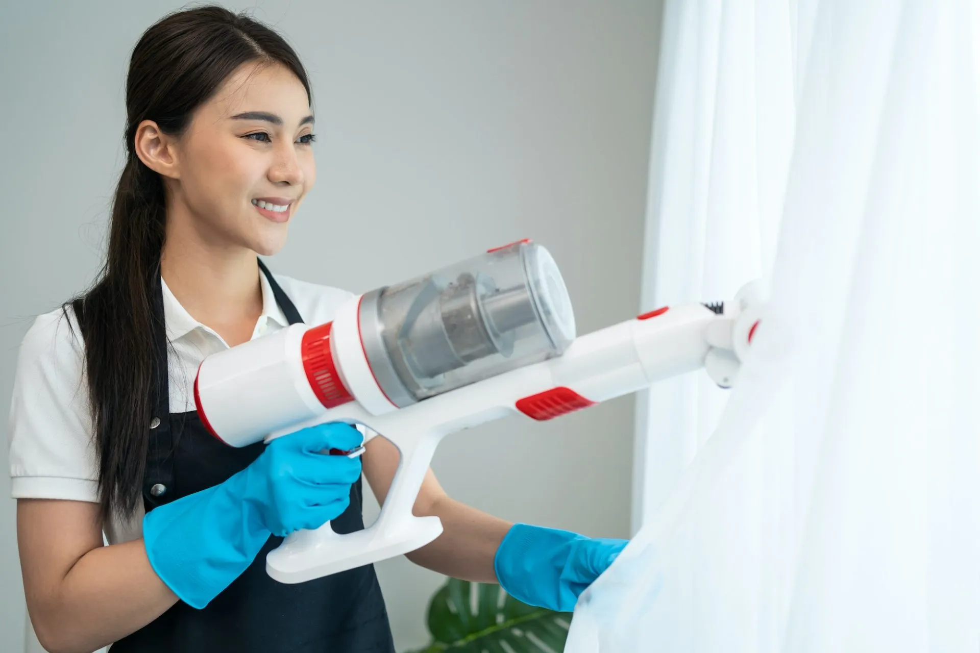 asian-cleaning-service-woman-worker-cleaning-in-living-room-at-home-1-1-e1680687963757-7